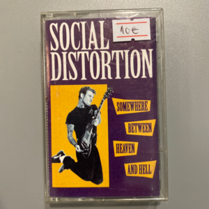 SOCIAL DISTORTION - SOMEWHERE BETWEEN HEAVEND AND HELL CASSETTE TAPE